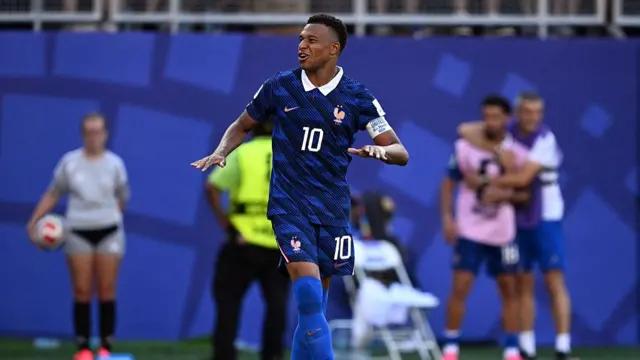 Kylian Mbappe celebrates