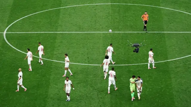 Morocco players on the pitch