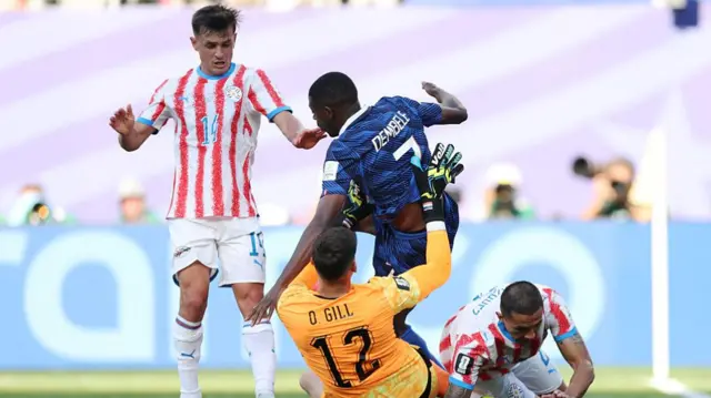 Ousmane Dembele lands on Orlando Gill