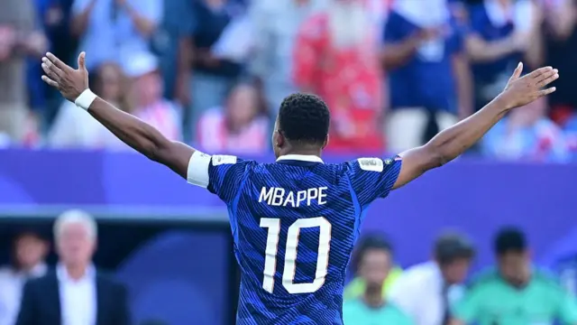 Kylian Mbappe celebrates scoring