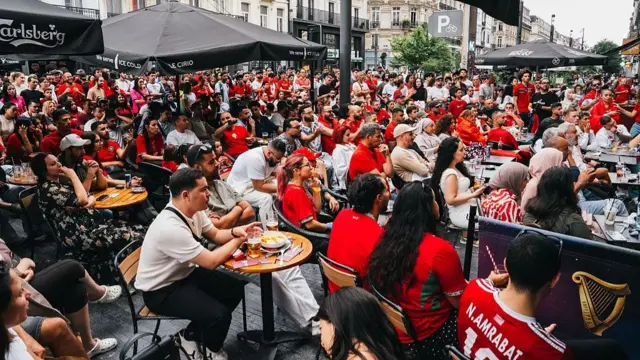Morocco fans watch the match