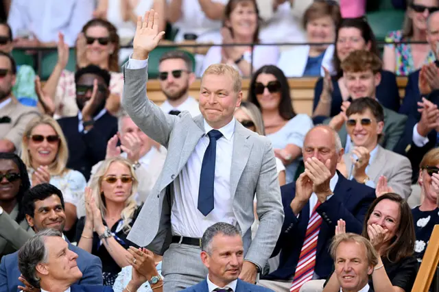 Sir Chris Hoy waves