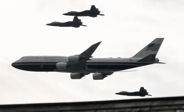 F22 Raptor fighter jets escort the new version of Air Force One over the National Mall in Washington DC on July 4 before thunderstorms threatened.