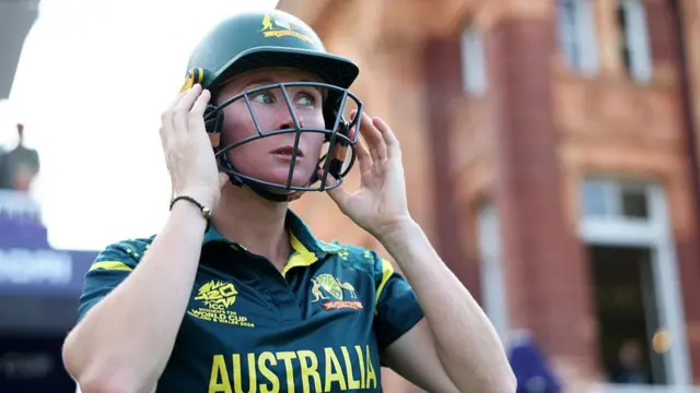 Beth Mooney of Australia looks on