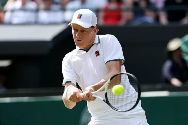 Jannik Sinner in action at Wimbledon