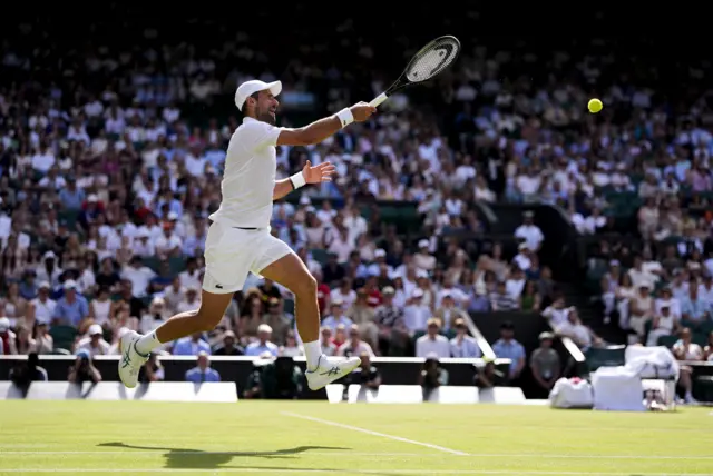 Djokovic plays a forehand