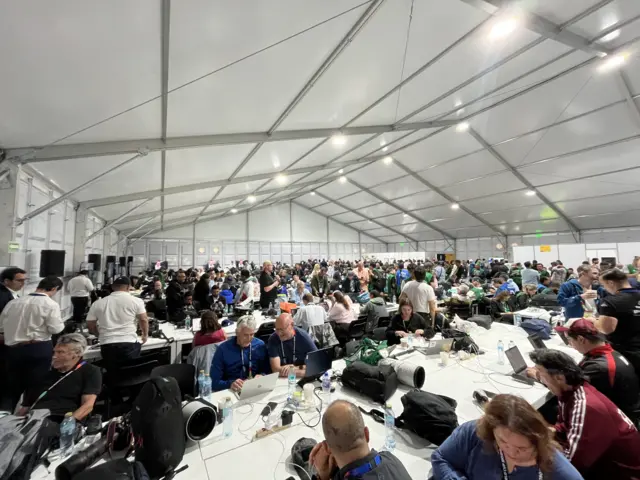 Media shelter in huge tent outside Azteca