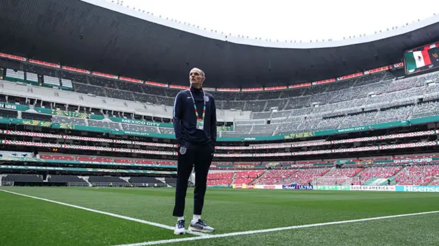Thomas Tuchel, Manager of England, looks on as he inspects the pitch at the Mexico City Stadium on July 04, 2026 in Mexico City, Mexico