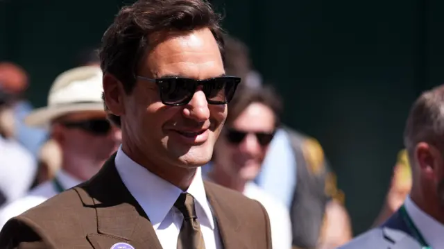 Roger Federer arrives at Wimbledon