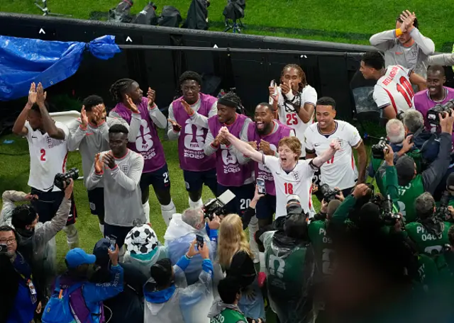 Anthony Gordon #18 and players of England celebrate