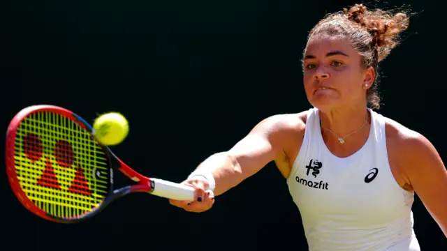 Jasmine Paolini hits a forehand