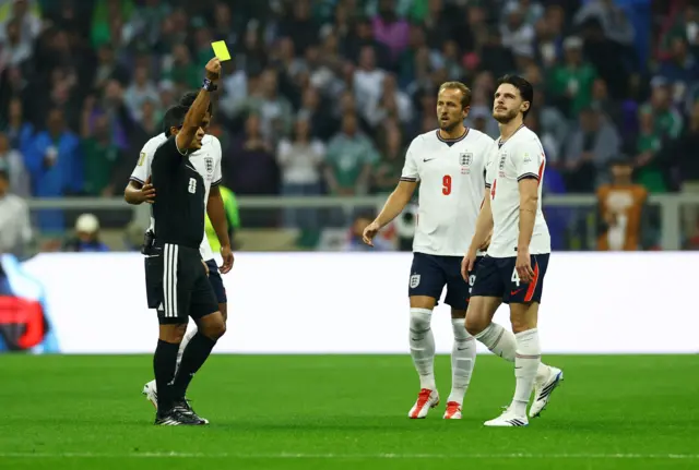 Declan Rice is shown a yellow card