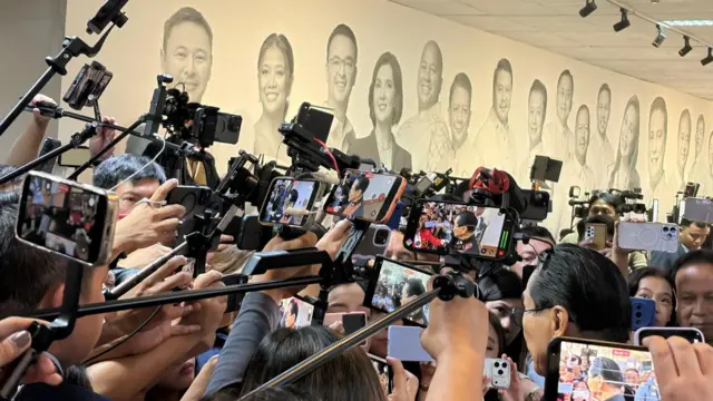 Cameras pointed at a man