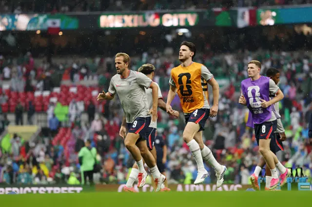 Harry Kane #9 and Declan Rice #4 of England warm up