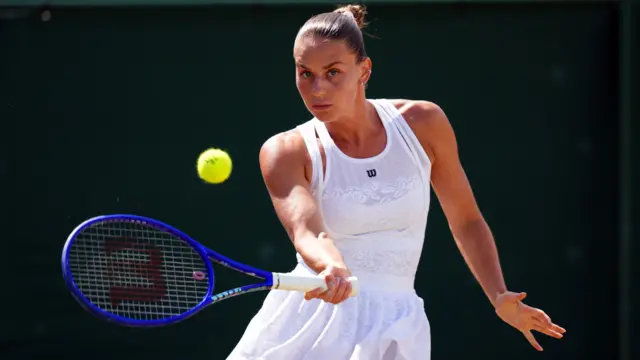 Marta Kostyuk hits a forehand
