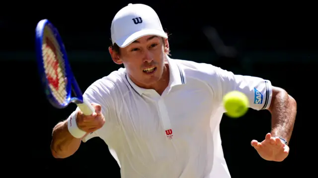 Alex de Minaur hits a forehand
