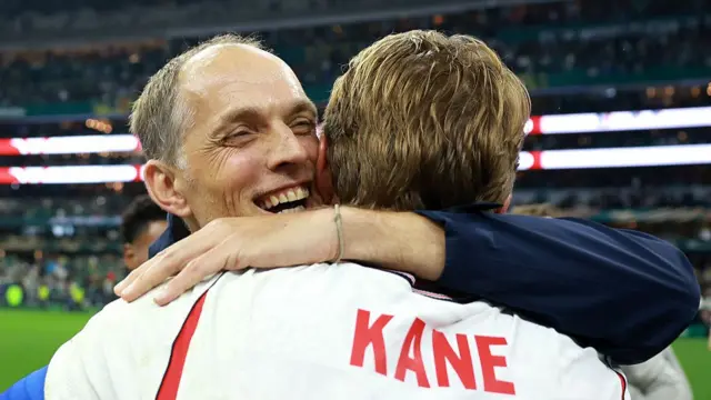 Thomas Tuchel, Manager of England, celebrates with Harry Kane #9 after the team's 3-2 victory during the FIFA World Cup 2026 Round of 16 match between Mexico and England at Mexico City Stadium on July 05, 2026 in Mexico City, Mexico.