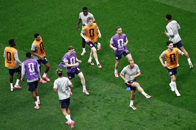 England's players warm up