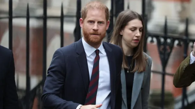 Britain's Prince Harry arrives at court during the first week of the lawsuit against Associated Newspapers