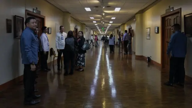 People gathered inside the Senate