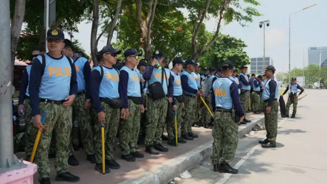 Police officers standing guard outside the Senate