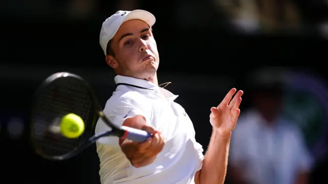 Arthur Fery hits a forehand
