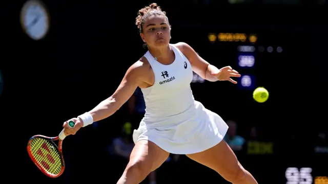Jasmine Paolini hits a forehand