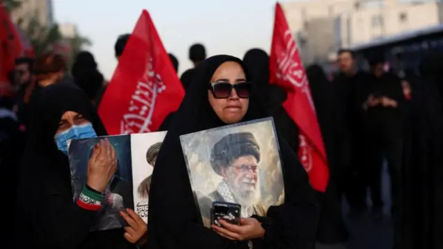 woman seen with red flags at funeral procession