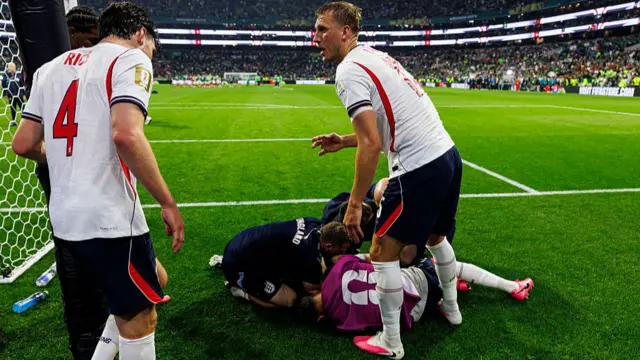 Declan Rice and Dan Burn with Jordan Henderson