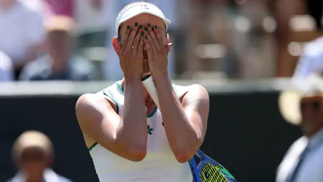 Elise Mertens celebrates