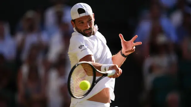Grigor Dimitrov hits a forehand
