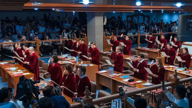 Philippine senators wearing robes will serve as judges in Vice-President Sara Duterte's impeachment trial