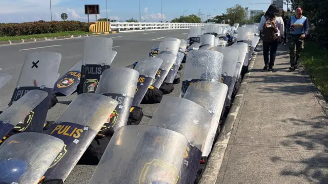 Riot shields lined along the roads