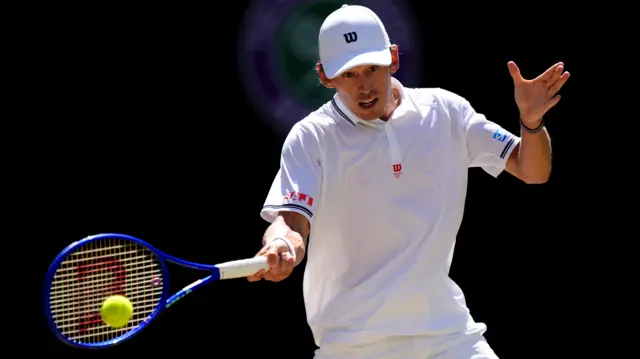 Alex de Minaur hits a forehand