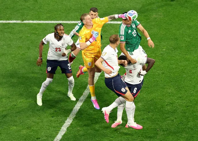 Jordan Pickford punches the ball away