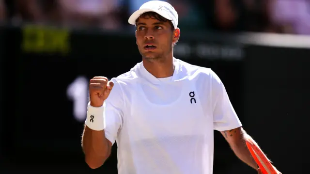 Flavio Cobolli celebrates