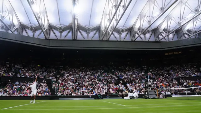 Play in progress under the roof on Centre Court