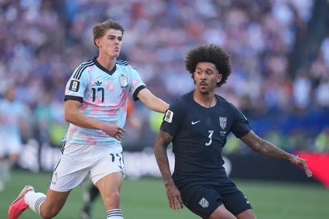 Charles De Ketelaere (17) of Belgium in action against Chris Richards