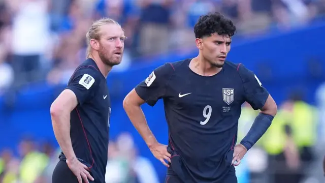 Tim Ream (L), and Ricardo Pepi (9) of USA react to the loss after the 2026 FIFA World Cup Round of 16 match between USA and Belgium at Lumen Field (Seattle Stadium) in Seattle, Washington, United States on July 6, 2026.
