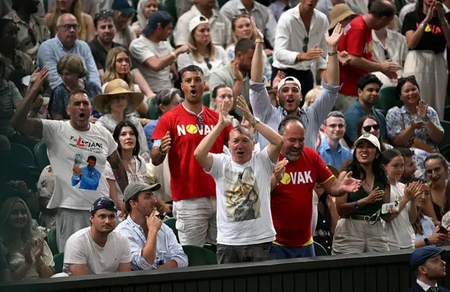 Fans of Novak Djokovic of Serbia show their support