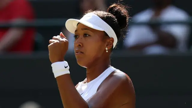 Naomi Osaka of Japan celebrates a point