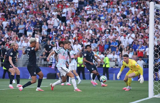 Charles De Ketelaere #17 of Belgium scores his team's first goal