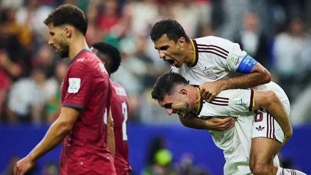 Aymeric Laporte #14 and Rodri #16 of Spain celebrate the team's 1-0 victory in the during the FIFA World Cup 2026 Round Of 16 match between Portugal and Spain at Dallas Stadium on July 06, 2026 in Arlington, Texas.
