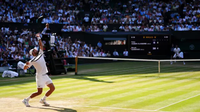 Novak Djokovic of Serbia serves