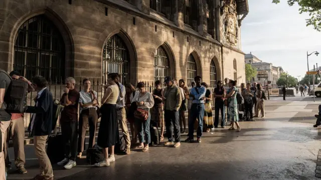 A long line of journalists waited outside the courthouse from dawn onwards