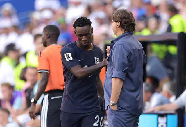 Folarin Balogun #20 of the United States shakes hands