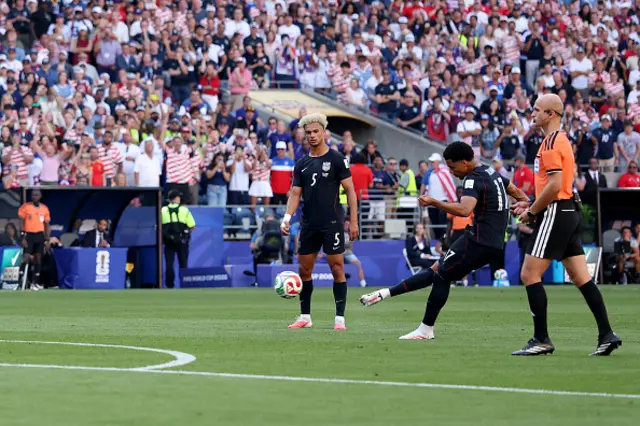 Malik Tillman #17 of the United States scores his team's first goal