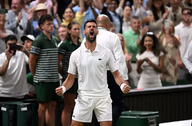 Novak Djokovic shouts in celebration