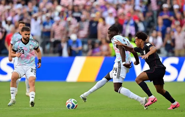 Belgium's Amadou Onana fights for the bal