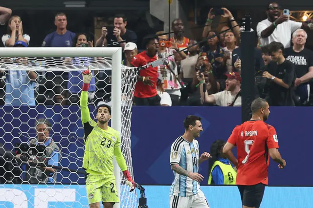 Messi reacts after missing